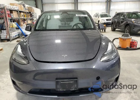 2023 Tesla Model Y из США, поврежденный, VIN 7SAYGAEE6PF881441